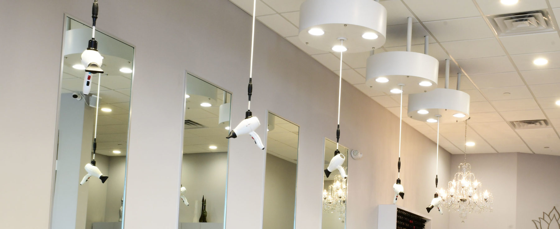 Vero Salon & Spa Embracing Freestyle Systems' Weightless Hair Drying and Premium Salon Lighting.
