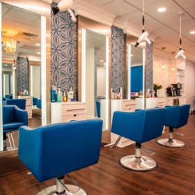 Freestylist systems over blue salon chairs