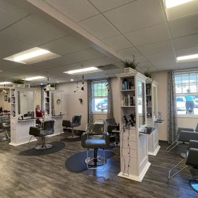 Full view of Hair Matters salon with multiple styling stations and waiting area
