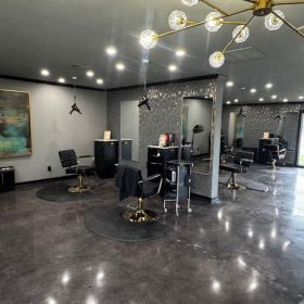 Freestylist dryer mounted over double salon stations in a luxury salon setting