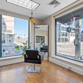 Salon styling station with large windows and Freestylist system J Roberts Salon Roanoke VA